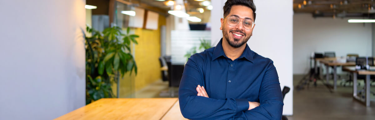 Smiling man in office